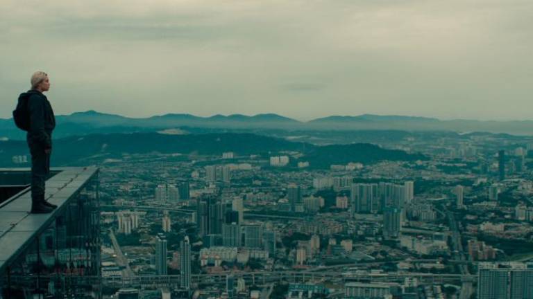 Pugh’s Yelena brings her sharp wit and combat skills to striking locations in Kuala Lumpur.