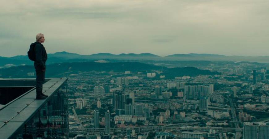 Pugh’s Yelena brings her sharp wit and combat skills to striking locations in Kuala Lumpur.