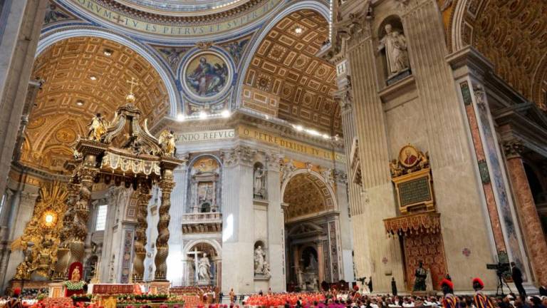 People attend the Holy Mass, celebrated for the election of the new pope, presided over by the Dean of the College of Cardinals, Cardinal Giovanni Battista Re, in St. Peter’s Basilica, at the Vatican, May 7, 2025. REUTERSpix