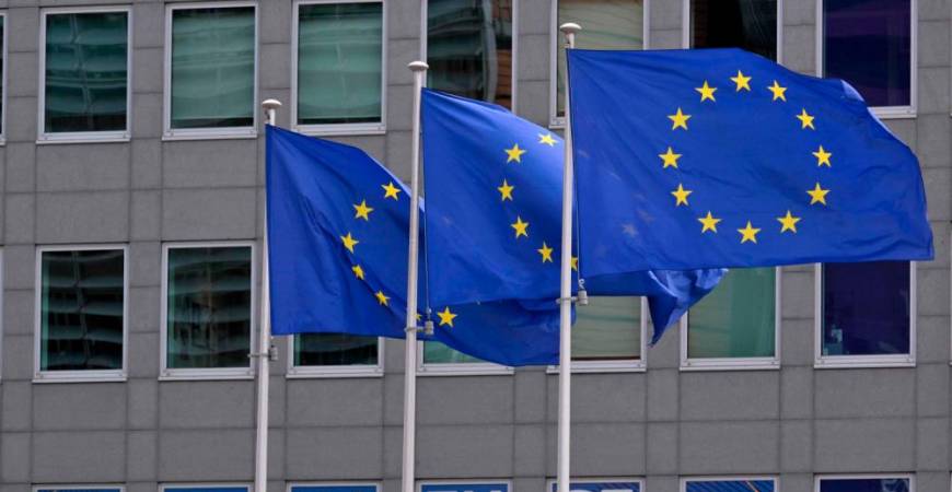 This photograph shows European flags outside the EU headquarters in Brussels on May 6, 2025.AFPpix